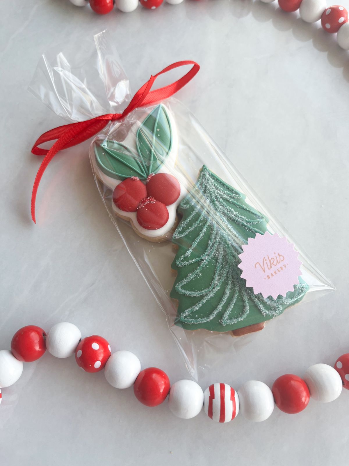 Dos galletas en bolsa con cinta